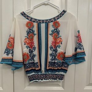 Small multi colored floral top from Jealous Tomato